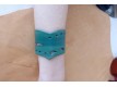 Bracelet turquoise en pointe en cuir ajouré